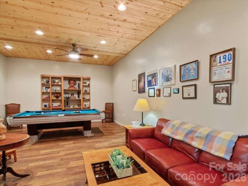 750 Barebridge Drive, Burnsville, NC 28714.  MLS# CAR4385574, YatesRealty ID 27865. Billiard room in basement