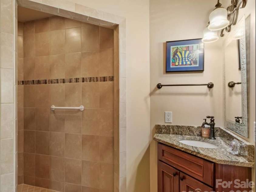 750 Barebridge Drive, Burnsville, NC 28714.  MLS# CAR4385574, YatesRealty ID 27865. Guest bath on upper level