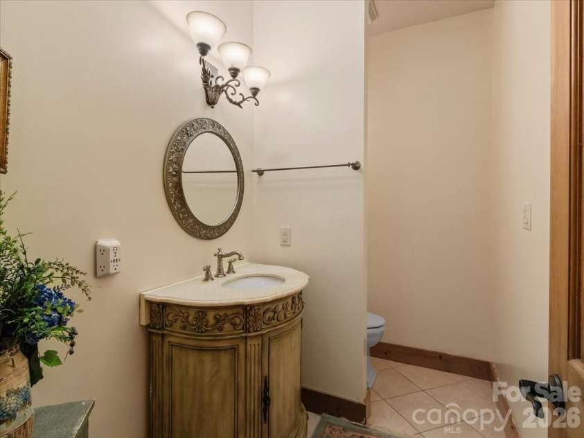 750 Barebridge Drive, Burnsville, NC 28714.  MLS# CAR4385574, YatesRealty ID 27865. Half bath on main level