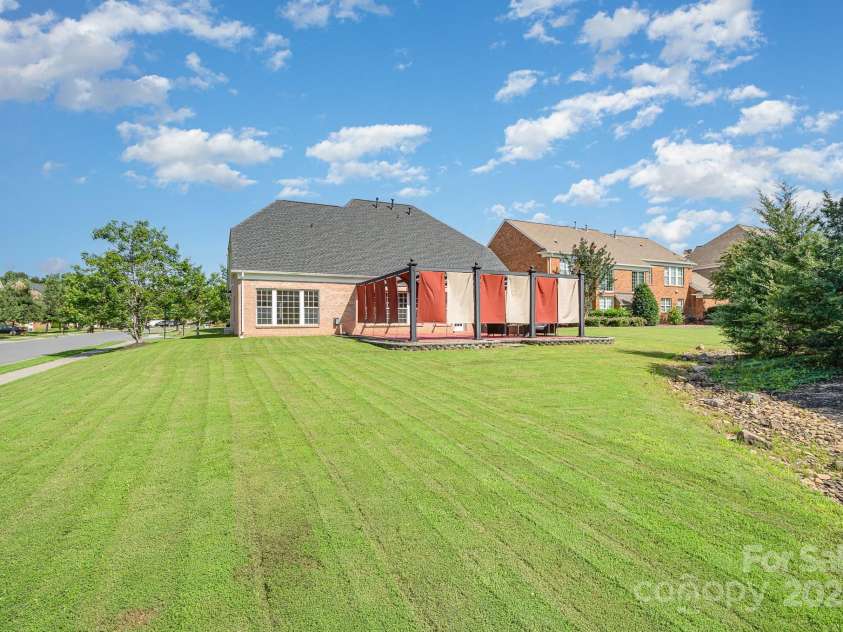 2100 Goddard Way, Waxhaw, NC 28173.  MLS# CAR4273203, YatesRealty ID 27868. Expansive backyard
