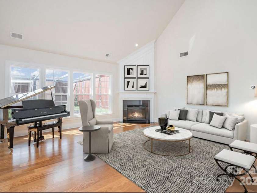 2100 Goddard Way, Waxhaw, NC 28173.  MLS# CAR4273203, YatesRealty ID 27868. Virtually staged living room