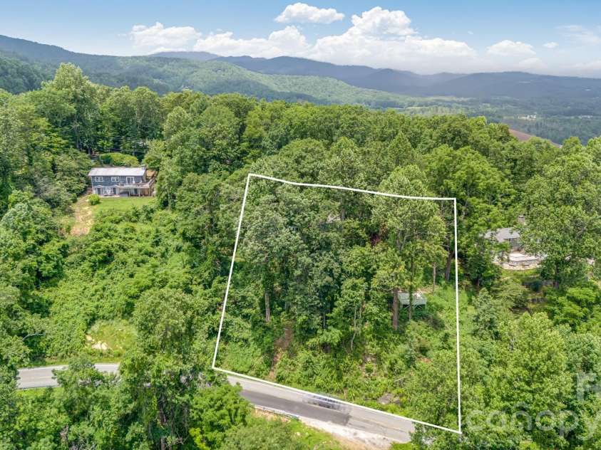 203 Laurel Lane, Little Switzerland, NC 28749.  MLS# CAR4361896, YatesRealty ID 27869. 