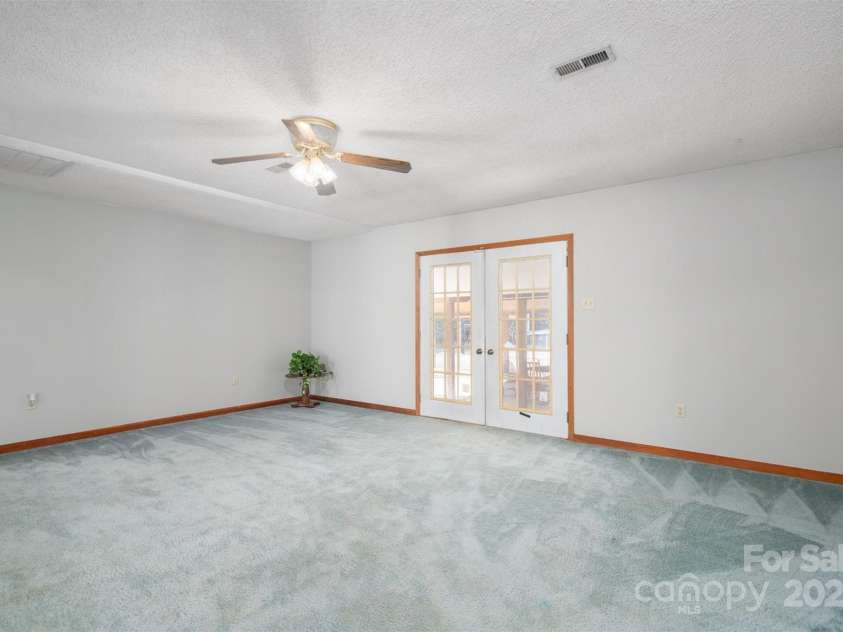 180 B And B Trail, Mooresboro, NC 28114.  MLS# CAR4224440, YatesRealty ID 2787. ...and the carport and pool area!