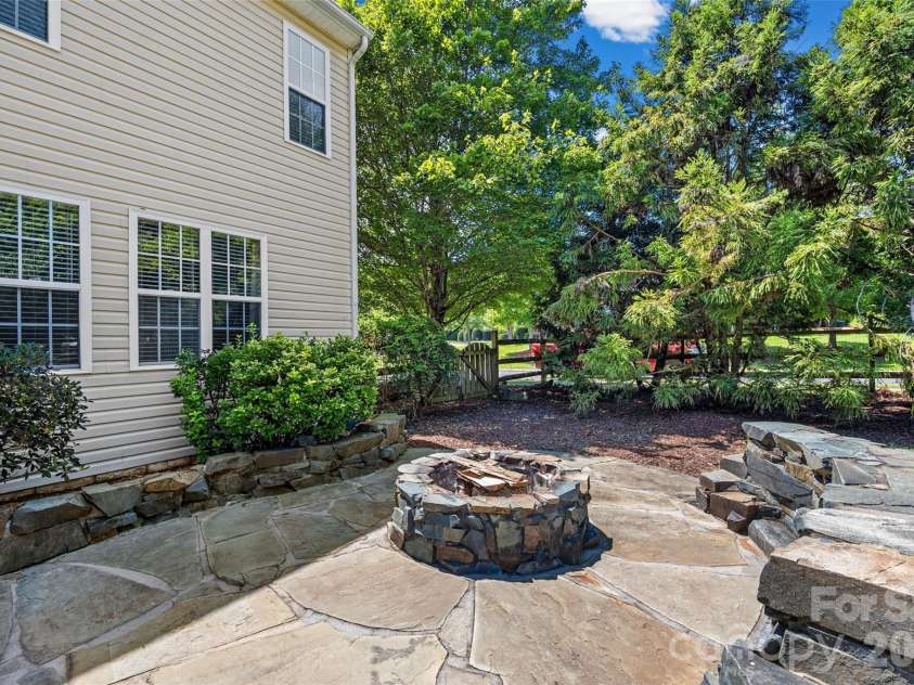9118 Spratt Lane, Waxhaw, NC 28173.  MLS# CAR4416867, YatesRealty ID 27872. Firepit