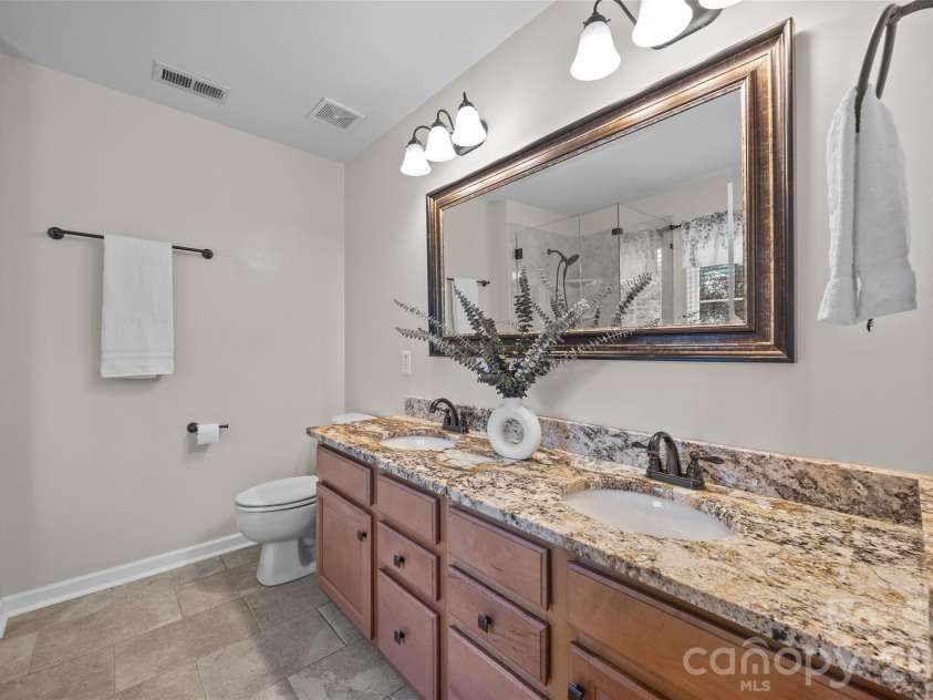 9118 Spratt Lane, Waxhaw, NC 28173.  MLS# CAR4416867, YatesRealty ID 27872. Primary Bath