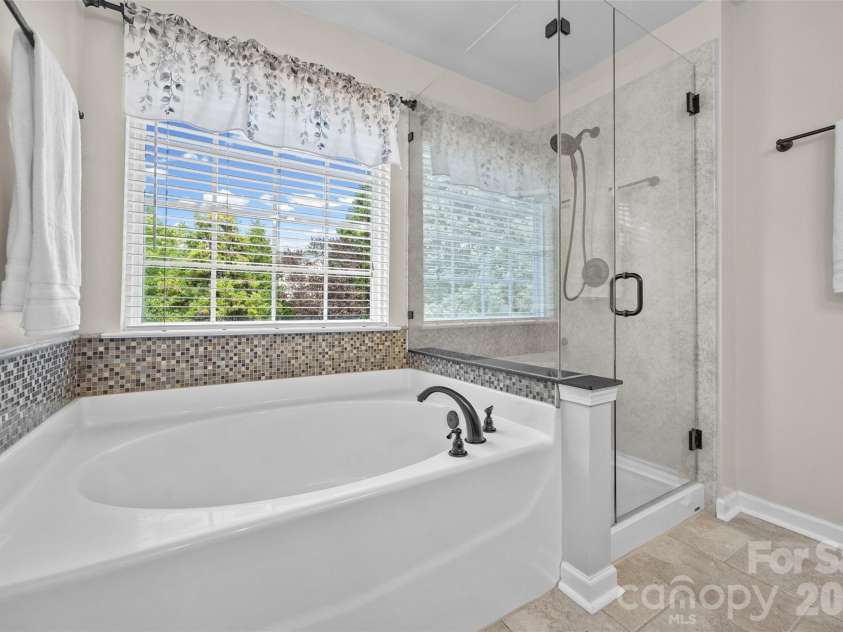 9118 Spratt Lane, Waxhaw, NC 28173.  MLS# CAR4416867, YatesRealty ID 27872. Primary Bath
