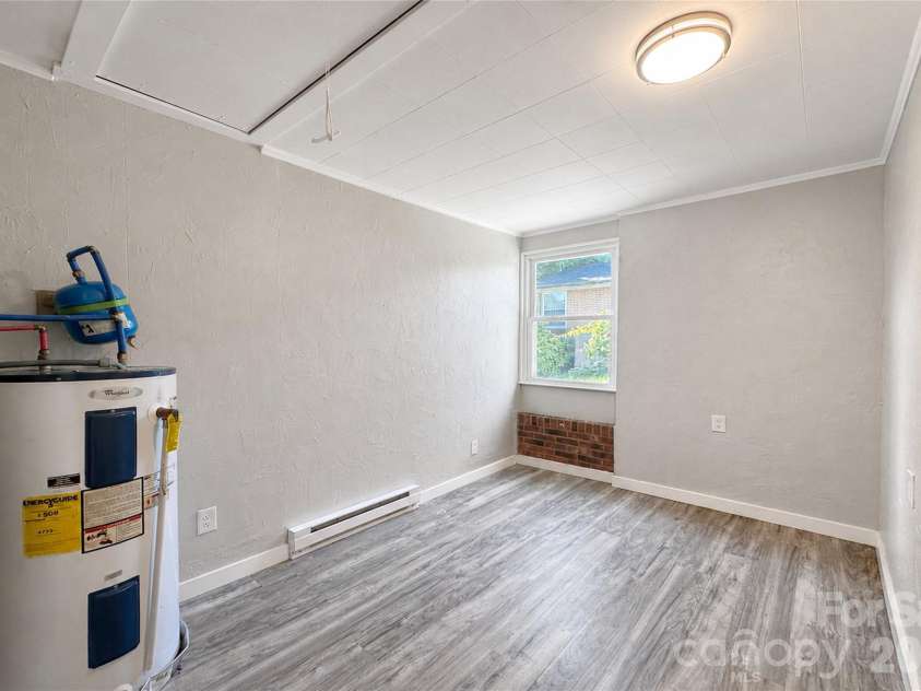 2121 24th Street, Hickory, NC 28601.  MLS# CAR4385228, YatesRealty ID 27879. Utility Room with walkup and Interior Access