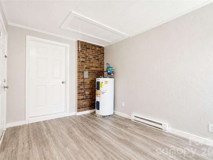 2121 24th Street, Hickory, NC 28601.  MLS# CAR4385228, YatesRealty ID 27879. Utility Room with walkup and Interior Access