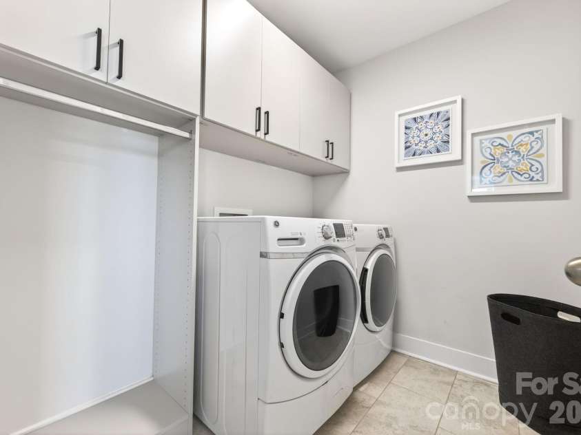 6271 Six String Court, Fort Mill, SC 29708.  MLS# CAR4384040, YatesRealty ID 27883. Laundry Room with Cabinetry