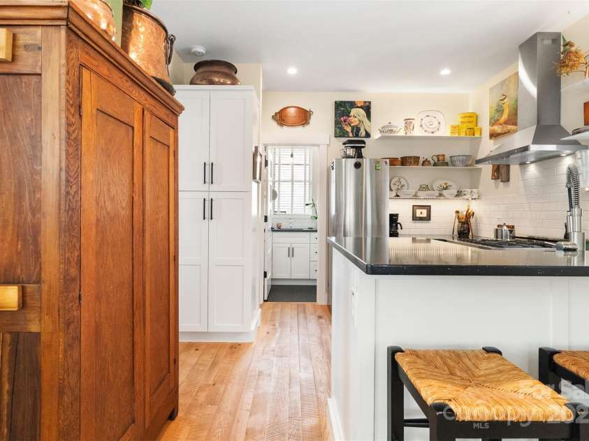 6 Houston Street, Asheville, NC 28801.  MLS# CAR4221476, YatesRealty ID 27884. Dining room looking toward kitchen