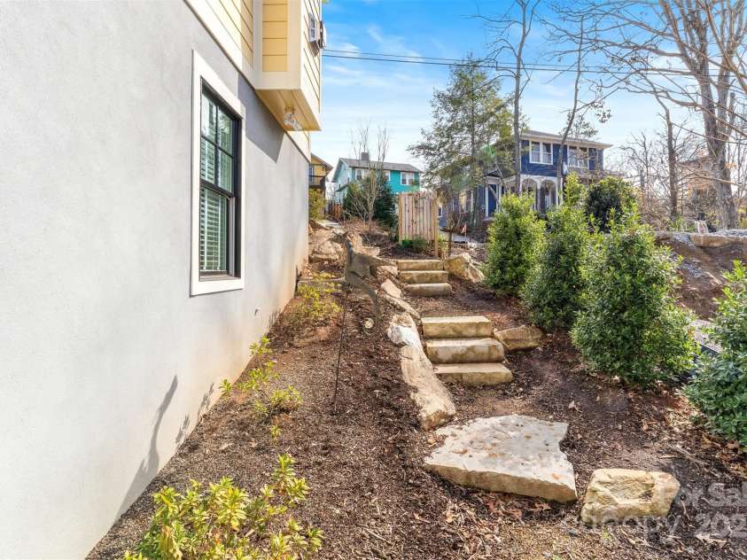 6 Houston Street, Asheville, NC 28801.  MLS# CAR4221476, YatesRealty ID 27884. Outside steps to lower level to exterior entrance