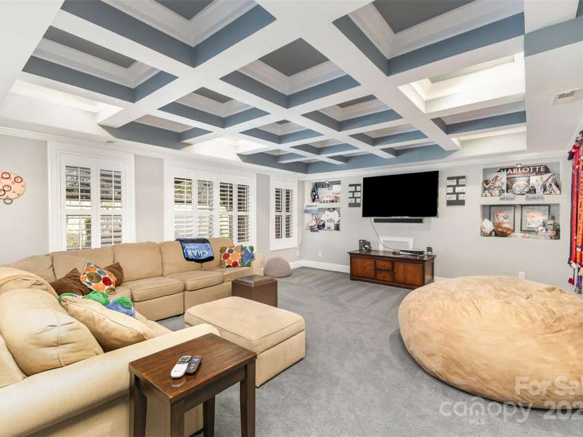 717 Barossa Valley Drive, Concord, NC 28027.  MLS# CAR4238339, YatesRealty ID 27886. Coffered ceilings in basement