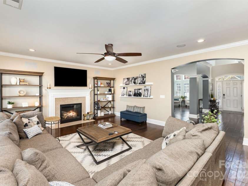717 Barossa Valley Drive, Concord, NC 28027.  MLS# CAR4238339, YatesRealty ID 27886. Generously bright living room