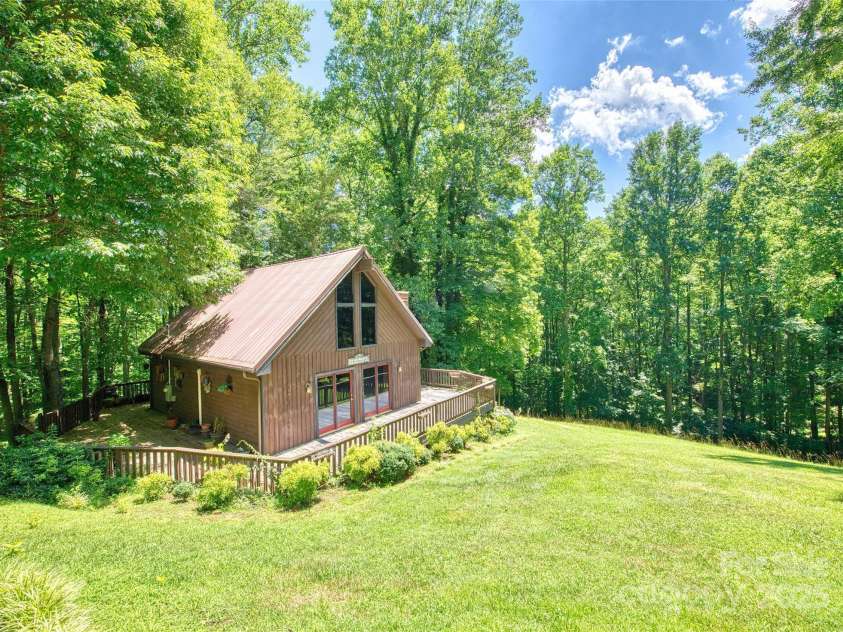 116 Treetops Drive, Candler, NC 28715.  MLS# CAR4278865, YatesRealty ID 27893. 
