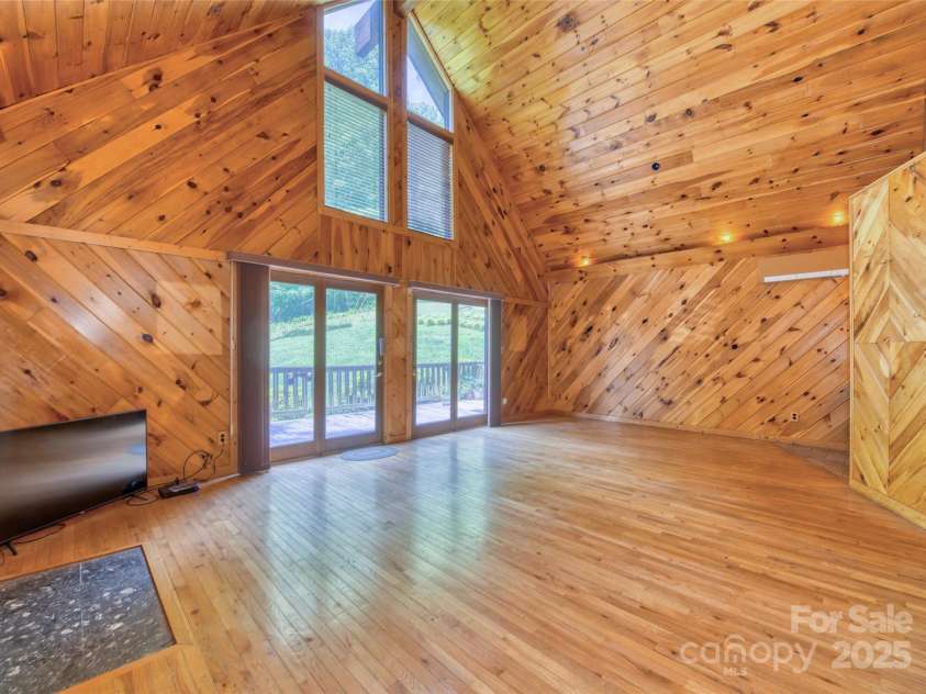 116 Treetops Drive, Candler, NC 28715.  MLS# CAR4278865, YatesRealty ID 27893. 