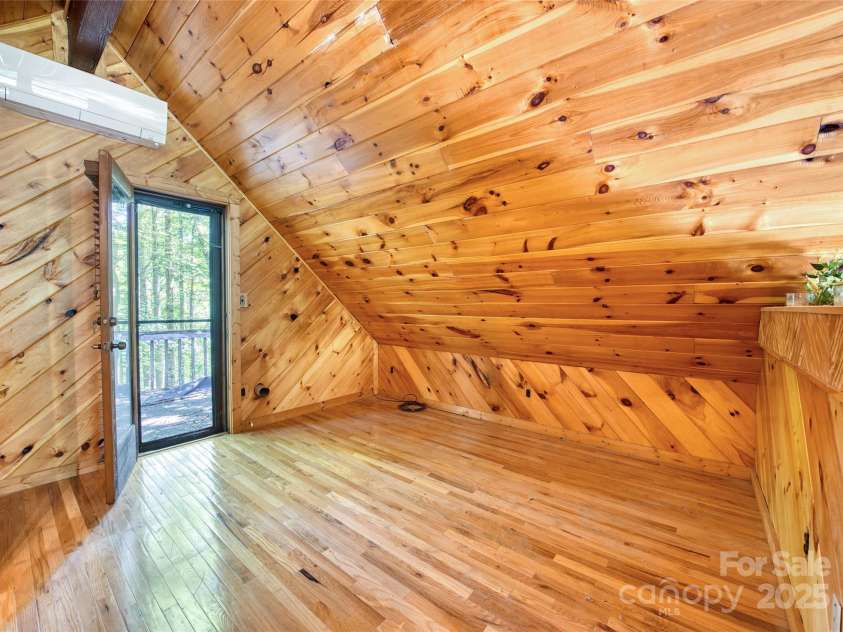 116 Treetops Drive, Candler, NC 28715.  MLS# CAR4278865, YatesRealty ID 27893. 