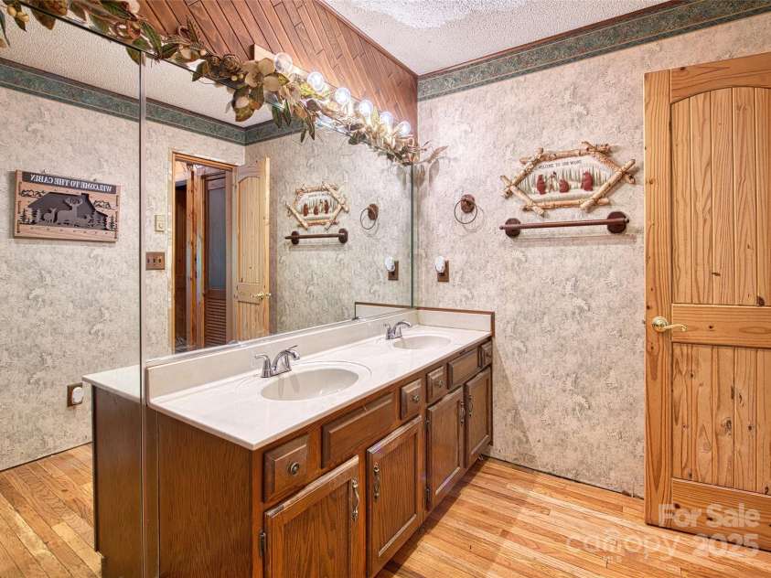 116 Treetops Drive, Candler, NC 28715.  MLS# CAR4278865, YatesRealty ID 27893. 