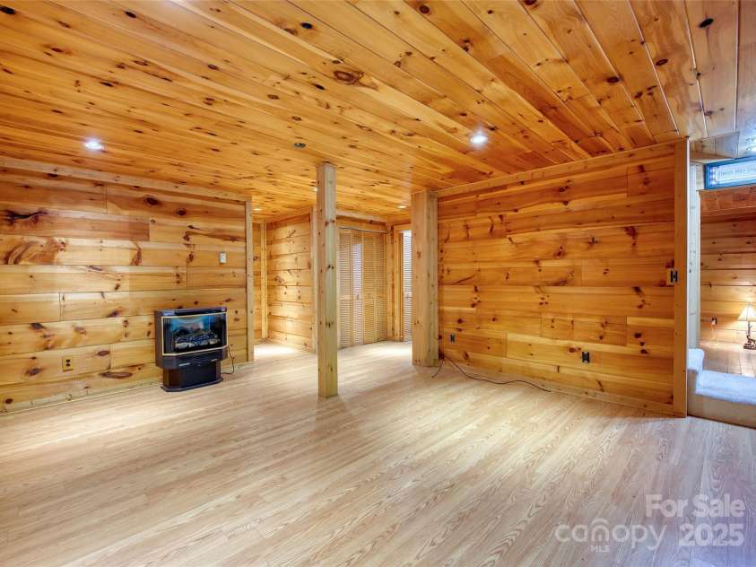 116 Treetops Drive, Candler, NC 28715.  MLS# CAR4278865, YatesRealty ID 27893. 