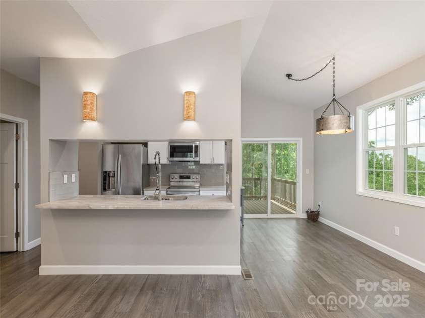 264 Splitrail Drive, Hendersonville, NC 28792.  MLS# CAR4260165, YatesRealty ID 27894. Gathering Bar at Kitchen.