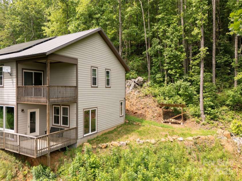 264 Splitrail Drive, Hendersonville, NC 28792.  MLS# CAR4260165, YatesRealty ID 27894. Rear views of Home.