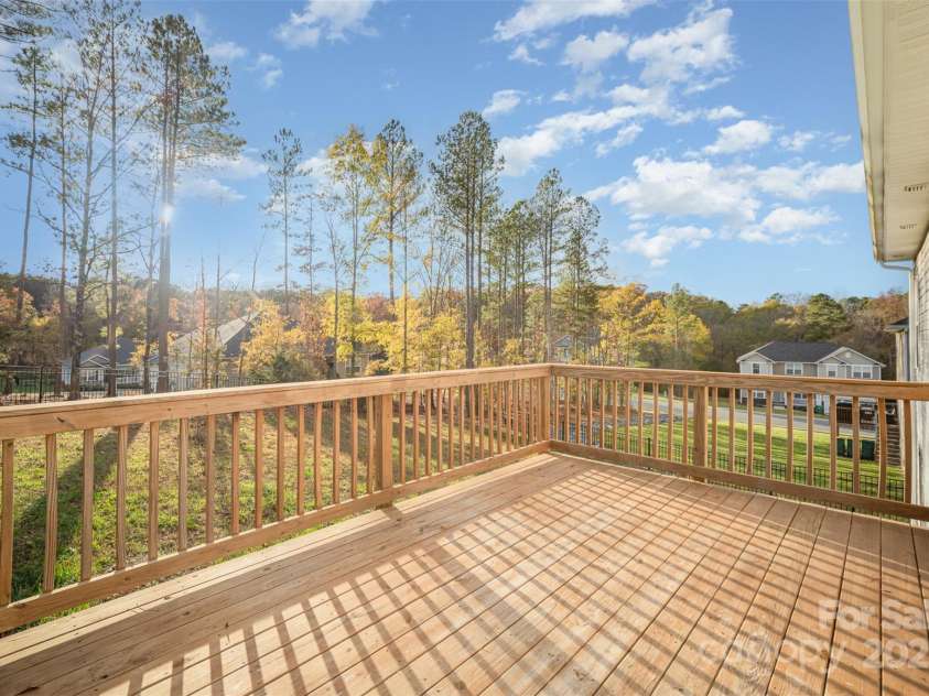 159 Rubys Way, Oakboro, NC 28129.  MLS# CAR4287834, YatesRealty ID 279. Photo at a different angle of the Spacious and Beautiful Wooden Deck.