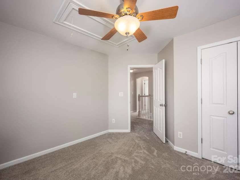 3329 Brownes Creek Road, Charlotte, NC 28269.  MLS# CAR4232626, YatesRealty ID 2790. Bedroom 1 with ceiling fan