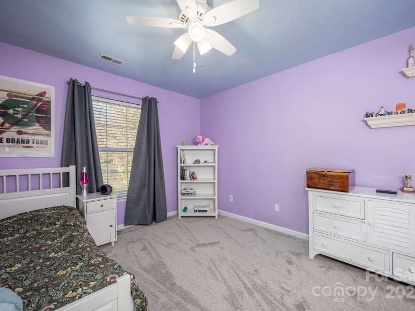 3329 Brownes Creek Road, Charlotte, NC 28269.  MLS# CAR4232626, YatesRealty ID 2790. Bedroom 2 with ceiling fan