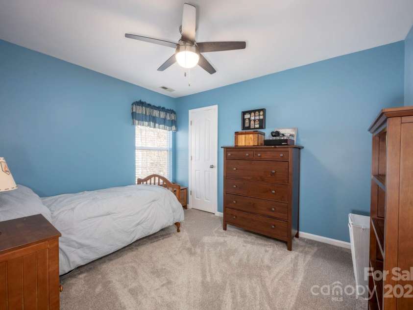 3329 Brownes Creek Road, Charlotte, NC 28269.  MLS# CAR4232626, YatesRealty ID 2790. Bedroom 3 with ceiling fan