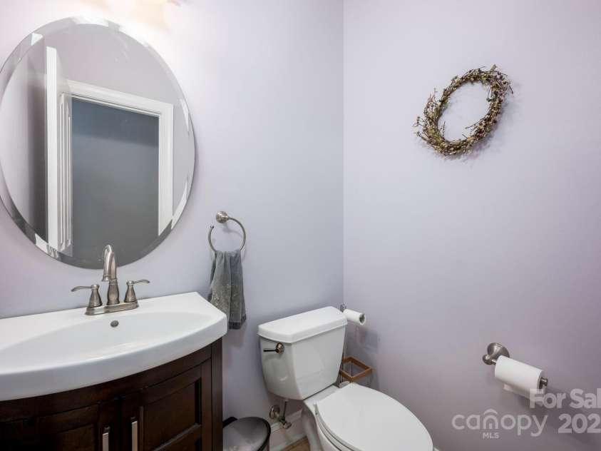 3329 Brownes Creek Road, Charlotte, NC 28269.  MLS# CAR4232626, YatesRealty ID 2790. Powder room on main level