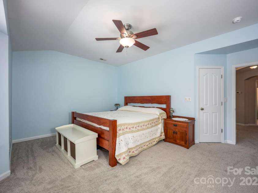 3329 Brownes Creek Road, Charlotte, NC 28269.  MLS# CAR4232626, YatesRealty ID 2790. Primary bedroom with ceiling fan