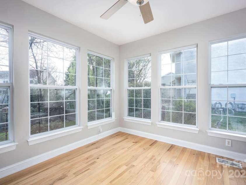3329 Brownes Creek Road, Charlotte, NC 28269.  MLS# CAR4232626, YatesRealty ID 2790. Sunroom with tons of natural light