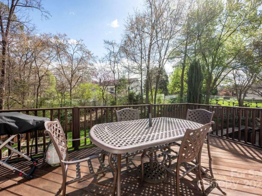 3329 Brownes Creek Road, Charlotte, NC 28269.  MLS# CAR4232626, YatesRealty ID 2790. Top tier deck with view of the backyard