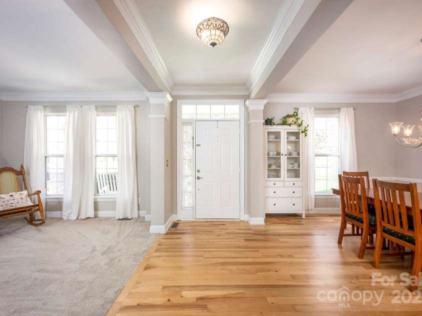 3329 Brownes Creek Road, Charlotte, NC 28269.  MLS# CAR4232626, YatesRealty ID 2790. View coming in front door.  Living room on the left and Dining room is on he right