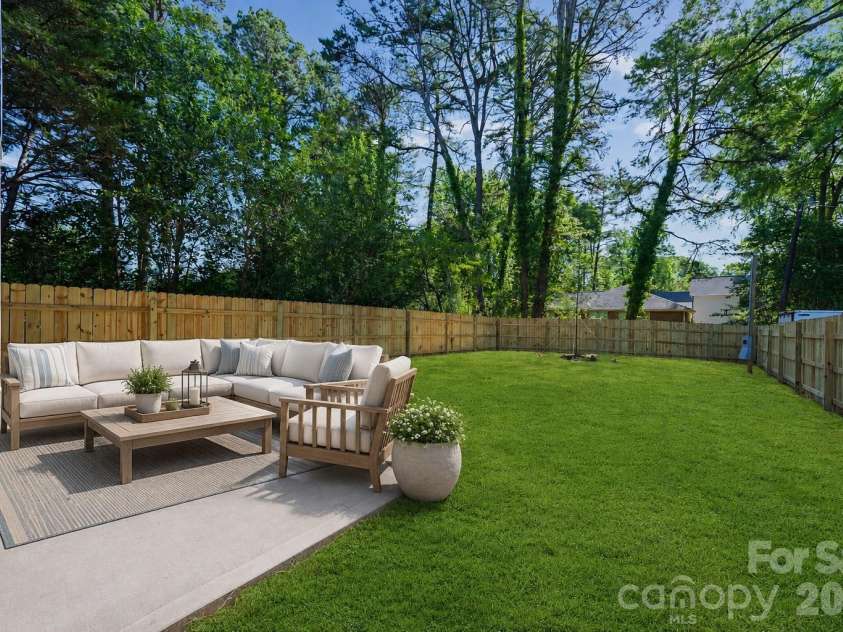 2406 Newland Road, Charlotte, NC 28216.  MLS# CAR4382166, YatesRealty ID 27901. Grass is virtually enhanced.  Lawn has been seeded