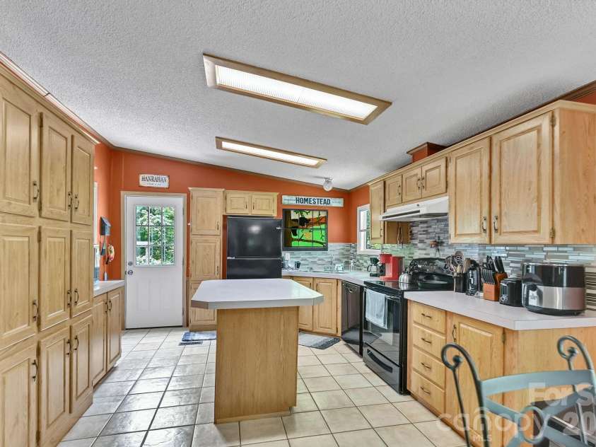 560 Morgan Branch Road, Marshall, NC 28753.  MLS# CAR4389335, YatesRealty ID 27905. 