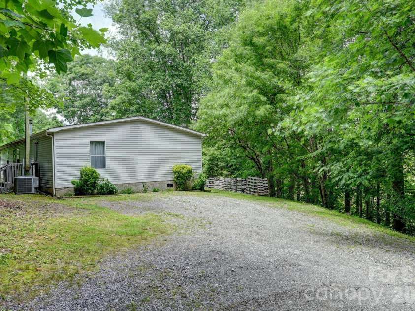 560 Morgan Branch Road, Marshall, NC 28753.  MLS# CAR4389335, YatesRealty ID 27905. 