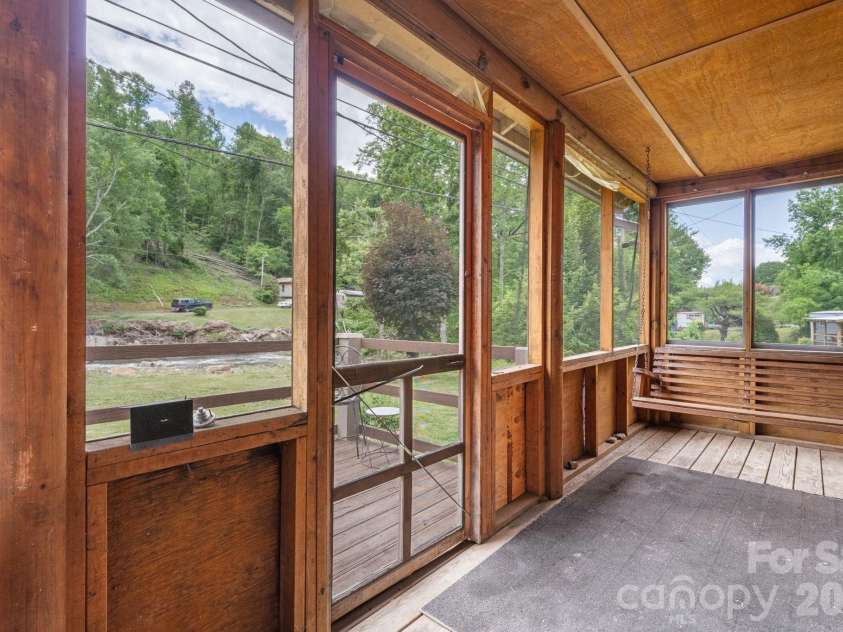3206 Fork Mountain Road, Bakersville, NC 28705.  MLS# CAR4386731, YatesRealty ID 27916. Back porch
