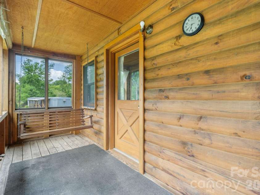 3206 Fork Mountain Road, Bakersville, NC 28705.  MLS# CAR4386731, YatesRealty ID 27916. Back porch