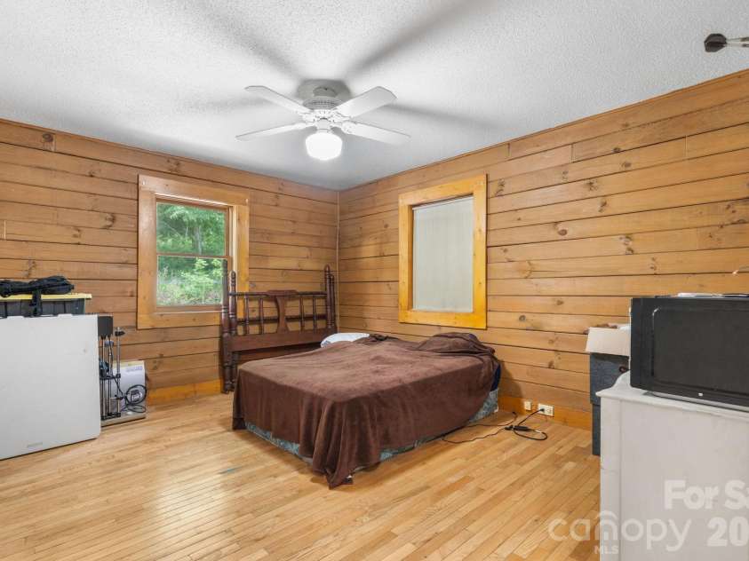 3206 Fork Mountain Road, Bakersville, NC 28705.  MLS# CAR4386731, YatesRealty ID 27916. Lower level bedroom