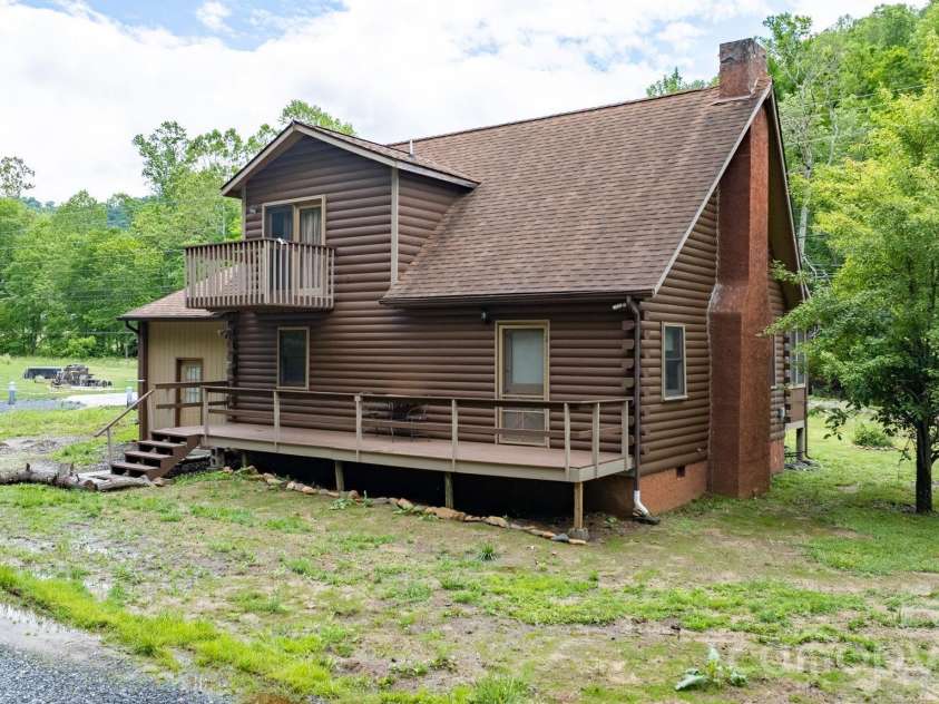 3206 Fork Mountain Road, Bakersville, NC 28705.  MLS# CAR4386731, YatesRealty ID 27916. Your cabin on the river!