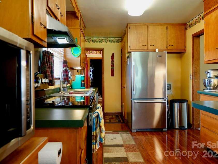 795 Monte Vista Road, Candler, NC 28715.  MLS# CAR4273590, YatesRealty ID 27916. Kitchen with updated appliances