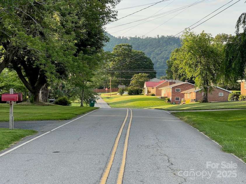 795 Monte Vista Road, Candler, NC 28715.  MLS# CAR4273590, YatesRealty ID 27916. Peaceful side street with mountain scenery.