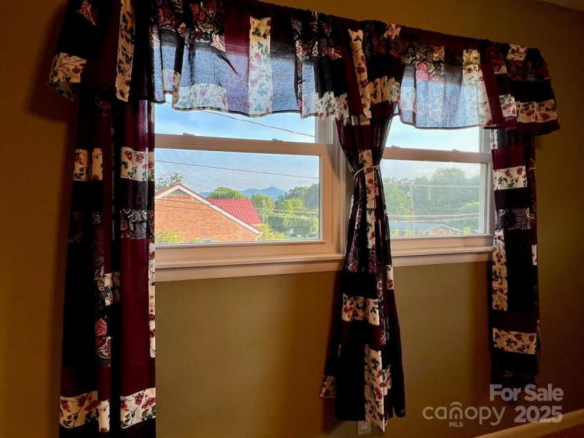 795 Monte Vista Road, Candler, NC 28715.  MLS# CAR4273590, YatesRealty ID 27916. Wake up to these views!