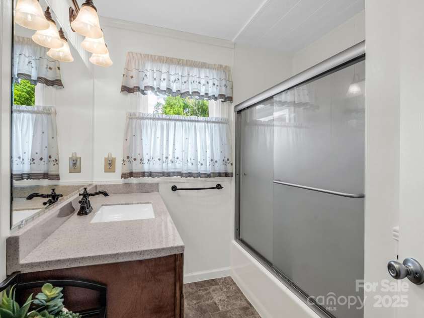 313 Resada Drive, Brevard, NC 28712.  MLS# CAR4278349, YatesRealty ID 27917. 