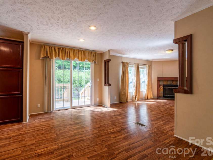 351 Mag Sluder Road, Alexander, NC 28701.  MLS# CAR4385877, YatesRealty ID 27928. Den/Dining Area