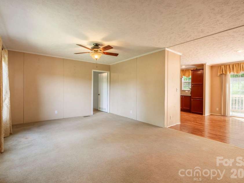 351 Mag Sluder Road, Alexander, NC 28701.  MLS# CAR4385877, YatesRealty ID 27928. Open Living/Dining Area
