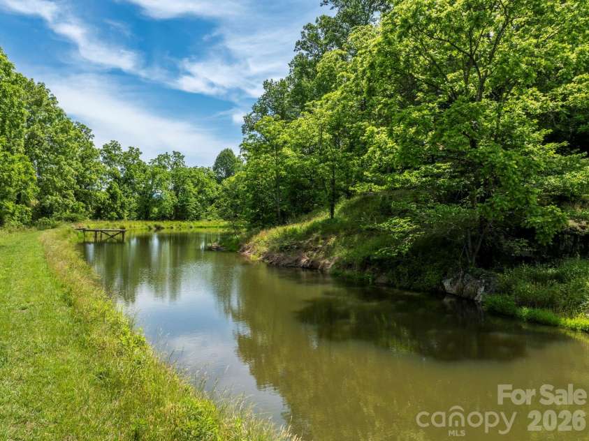 351 Mag Sluder Road, Alexander, NC 28701.  MLS# CAR4385877, YatesRealty ID 27928. Pond