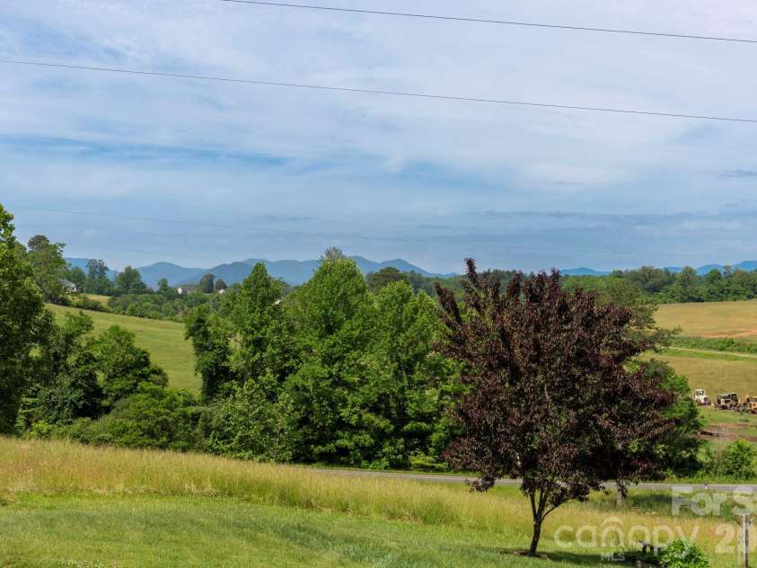 351 Mag Sluder Road, Alexander, NC 28701.  MLS# CAR4385877, YatesRealty ID 27928. Year Round Long Range Mountain Views