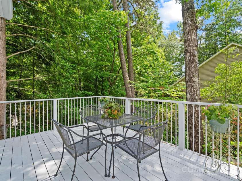 113 Fox Cross Drive, Brevard, NC 28712.  MLS# CAR4283870, YatesRealty ID 27930. Back deck with stairs to access backyard
