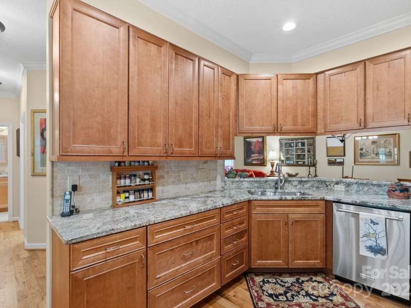 113 Fox Cross Drive, Brevard, NC 28712.  MLS# CAR4283870, YatesRealty ID 27930. Remodeled kitchen with granite and stainless steel